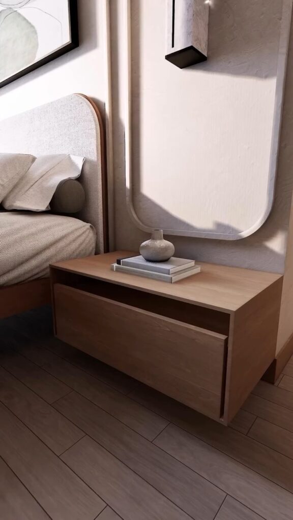 A contemporary bedroom interior with a curved upholstered headboard and warm wood nightstand, designed by ZM Architects.