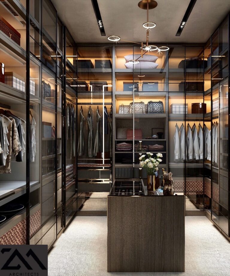 A dark wood and glass walk-in closet with integrated display shelving, designed by ZM Architects for a custom residence.