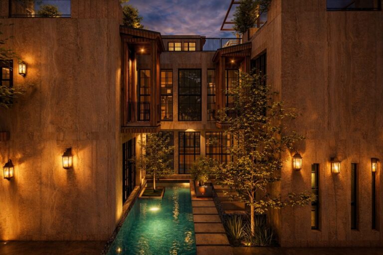 A minimalist concrete residence in Lahore with an illuminated courtyard pool and clean architectural lines, designed by ZM Architects.
