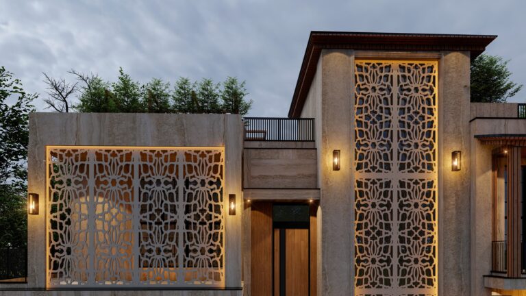 A custom residence in Lahore featuring a perforated metal screen facade illuminated at dusk, designed by ZM Architects.